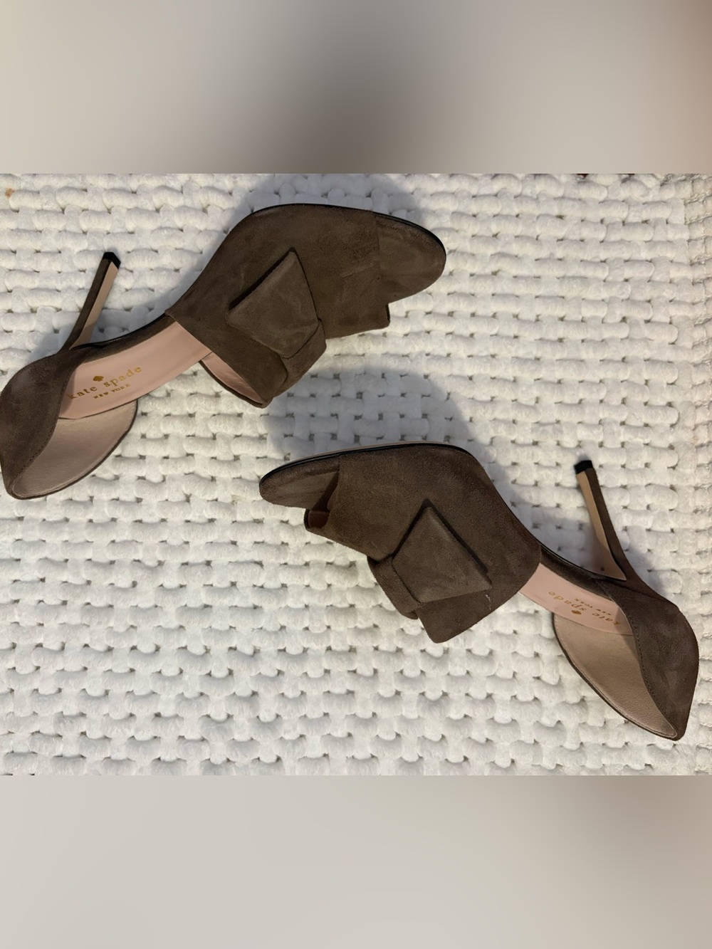 Kate Spade Brown Kid Suede peep toe heels with front flat bow and closed back.
